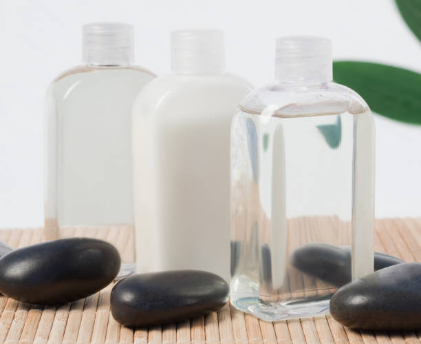 istock Black stones and massage oil 855417226