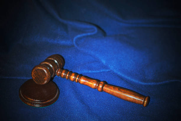 istock The judge's gavel on a dark blue background 855424630