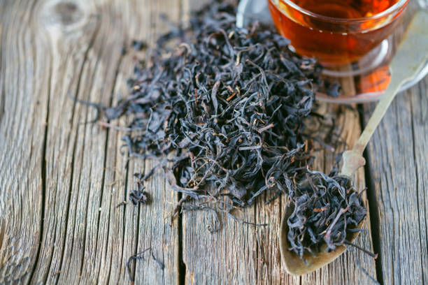 istock Dry and boiled cheenese tea, closeup view 855428432