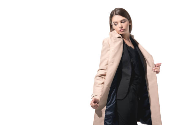 stylish elegant woman posing in trench coat, isolated on white