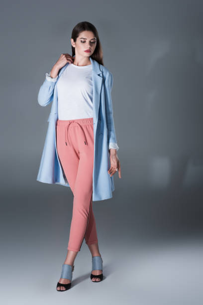 istock girl in blue trench 855433414