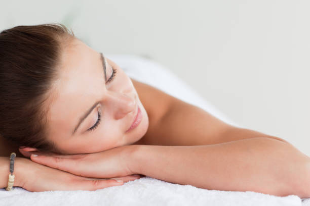 istock Close up of a young brunette lying on a massage table 855433878