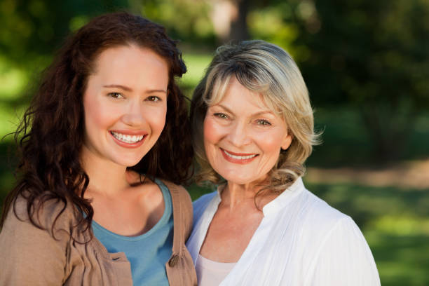 istock Mother with her daughter looking at the camera 855434032