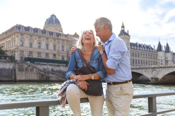 Seniors taking a break in Paris relaxing on the Seine River