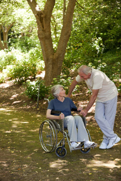 istock Senior couple in the wood 855443708
