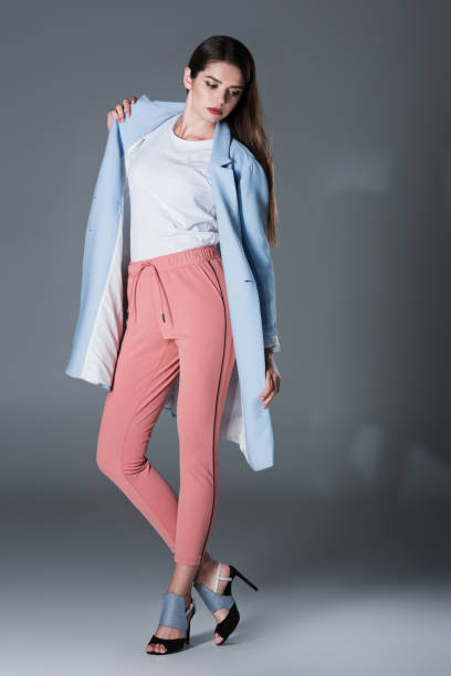 istock girl in blue trench 855444794