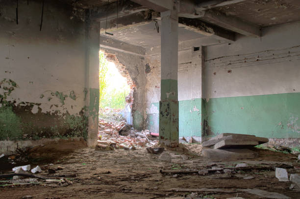 istock Ruined factory hall 855454312