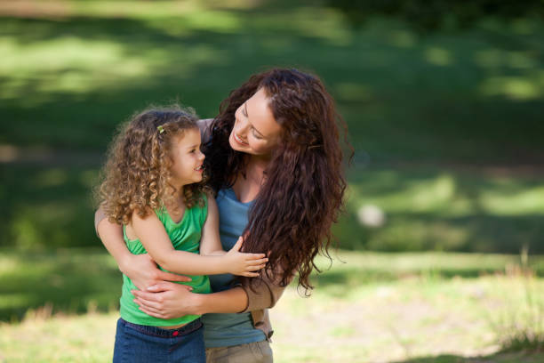 istock Daughter with her mother in the park 855458894