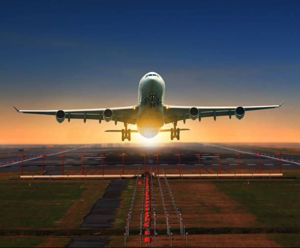 istock jet plane taking off from airport runway for traveling and logistic theme 855459546