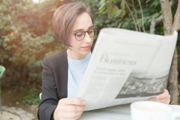 istock Businesswoman Having Coffee Break 855461638