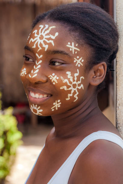 Nosy Be, Madagascar, apr 4, 2017: Sakalava young woman with his traditional beauty mask.