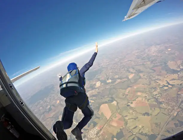 Photo of Parachutist jump from the plane.