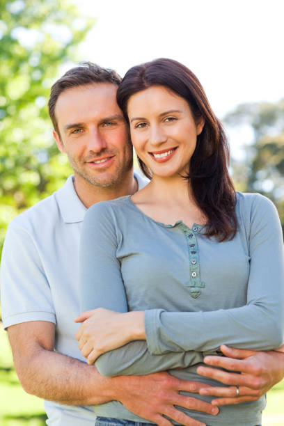 istock Lovely couple in the park 855463550