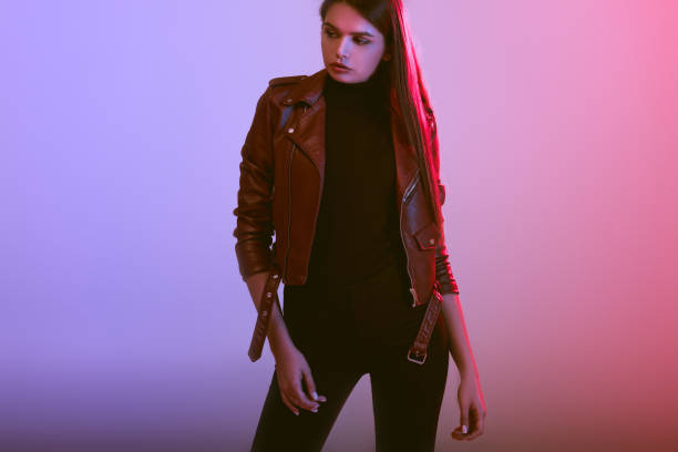 istock fashionable girl in leather jacket 855467704