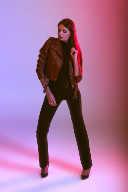 istock girl in leather jacket 855468110