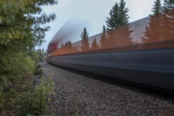 istock Moving Train in the Rocky Mountains 855475368