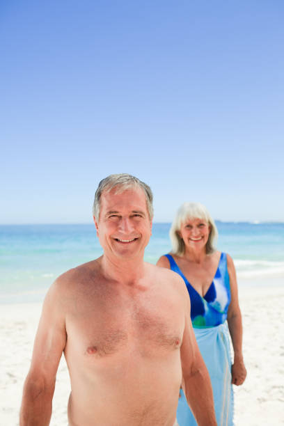 istock Radiant couple on the beach 855478702