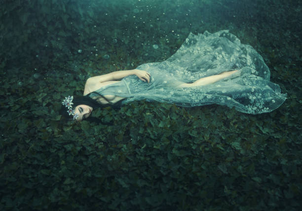 istock Fantasy girl in a fairy garden 855479062