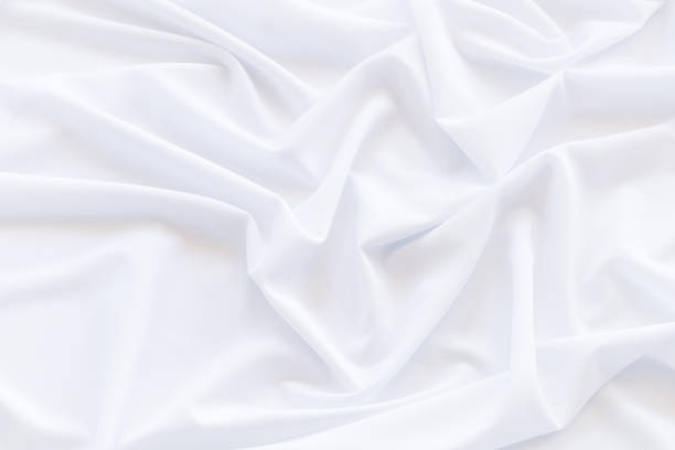 istock White cloth background and texture, Crumpled of white fabric abstract 855479704