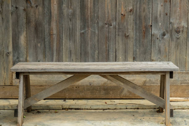 istock wooden chair with old wood wall. 855485076