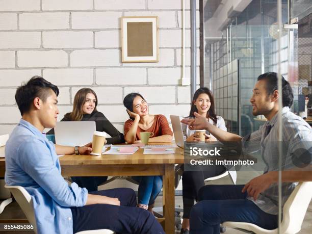 Multiethnic Business Team Meeting In Office Stock Photo - Download Image Now - Asian and Indian Ethnicities, Asia, Office