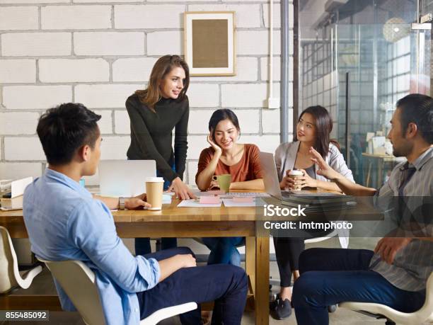 Multiethnic Business Team Meeting In Office Stock Photo - Download Image Now - Meeting, Asian and Indian Ethnicities, Asia