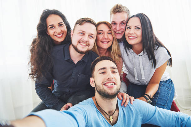 istock Best friends taking selfie outdoors with backlighting - Happy friendship concept with young people having fun together 855485362
