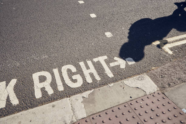 istock Pedestrian crossing in London on a sunny day 855493110