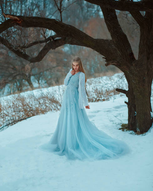 istock Lady in a luxury lush blue dress 855504376