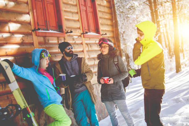 istock Four people talking and planing winter day 855508604