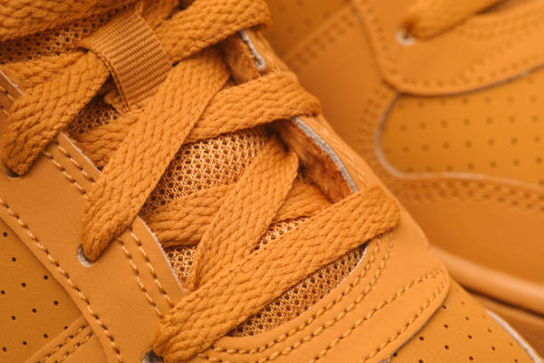 istock Brown sport shoes close up 855512102