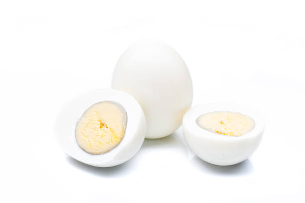 istock boiled sliced chicken eggs isolated on white background 855515622