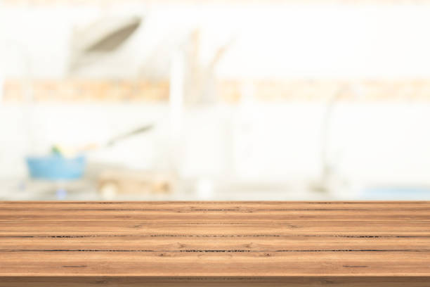 istock Empty table top on blurred background from kichen room,space for montage you product 855517104