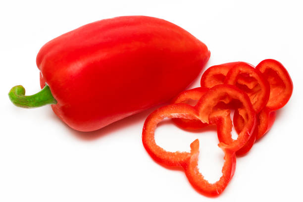 istock Red sweet bell pepper slices isolated on white background 855520266