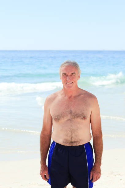 istock Mature man at the beach 855520298