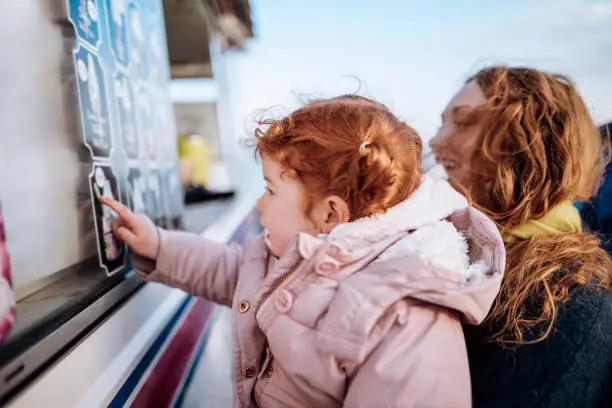 Photo of Little Redhead Girls at an Ice-Cream Van