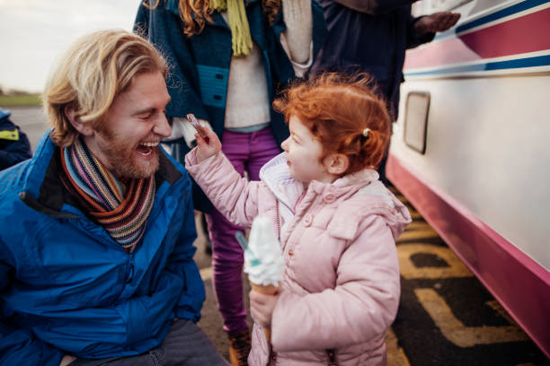 istock Father and Daughter at an Ice-Cream Van 855522086