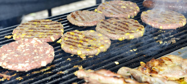 istock grilling meat on the coals on a barbecue 855524862
