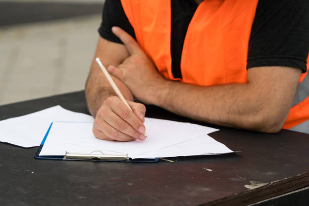 istock Civil engineer's hands analysing the conception and design of a project 855525600