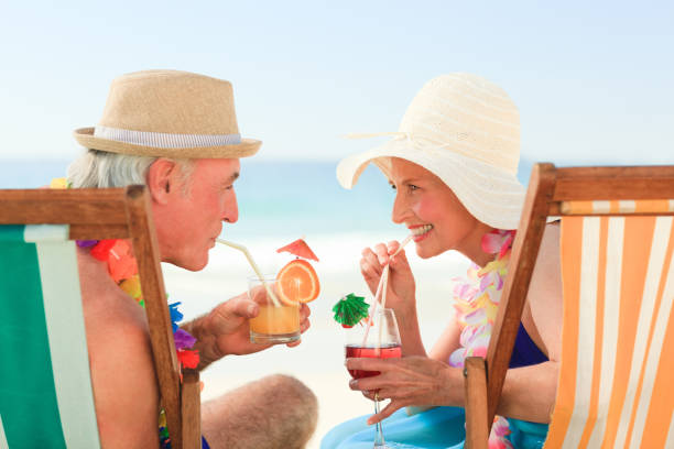istock Happy senior couple drinking a cocktail 855529010