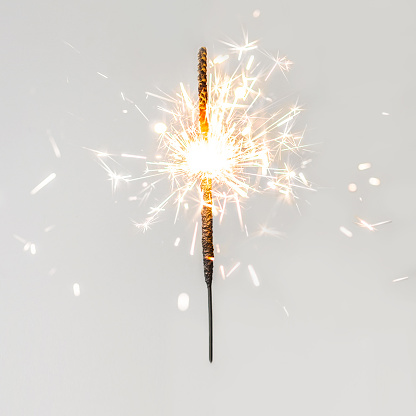 Christmas glittering  sparklers. decoration lighting element. Festive  Magic sparks lights for holiday poster, birthday or party concept. Xmas decoration lighting element.