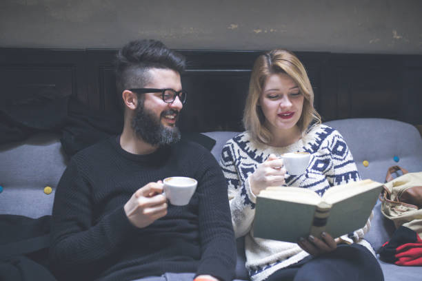 istock Hipster young couple studying together at cafe 855536872