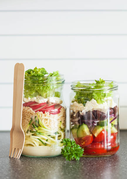 istock healthy vegetable and cheese salad in mason jars 855543228