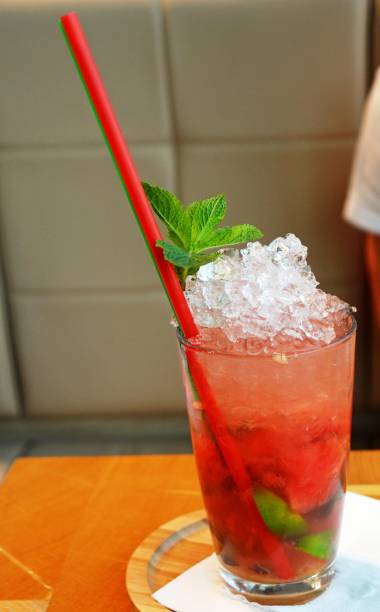 istock Mojito fresh cocktail drink with ice and mint on a glass. 855543442