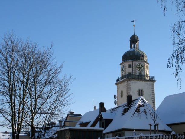 istock Germany: Romanesque church tower in Eastern Thuringia on a beautiful winter day 855544032