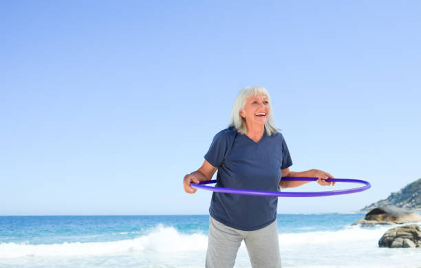 istock Senior woman playing with her hoop 855544230