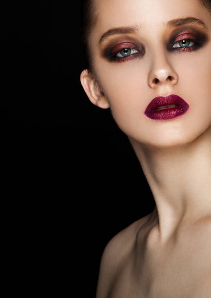 istock Beauty portrait red eyes and lips make up model 855547020
