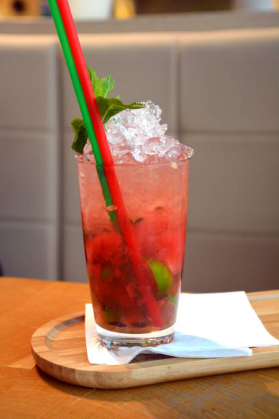 istock Mojito fresh cocktail drink with ice and mint on a glass. 855547314