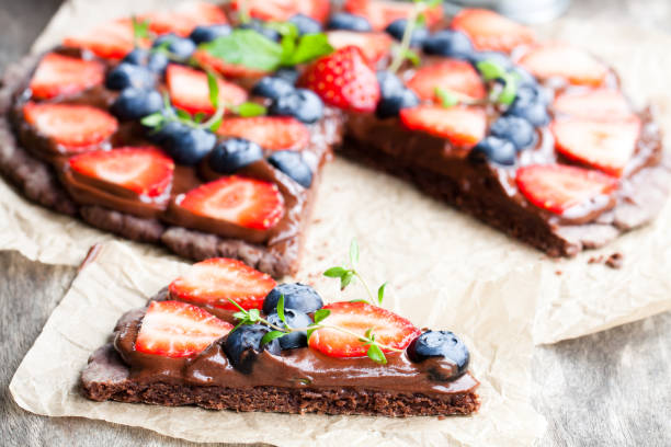 Homemade  chocolate natural fruit pizza with berries