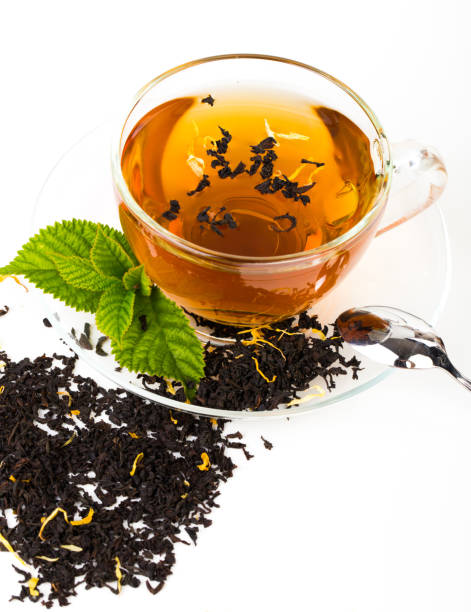 istock Glass Cup Tea with camomile flower and Mint Leaf, on white background 855553804